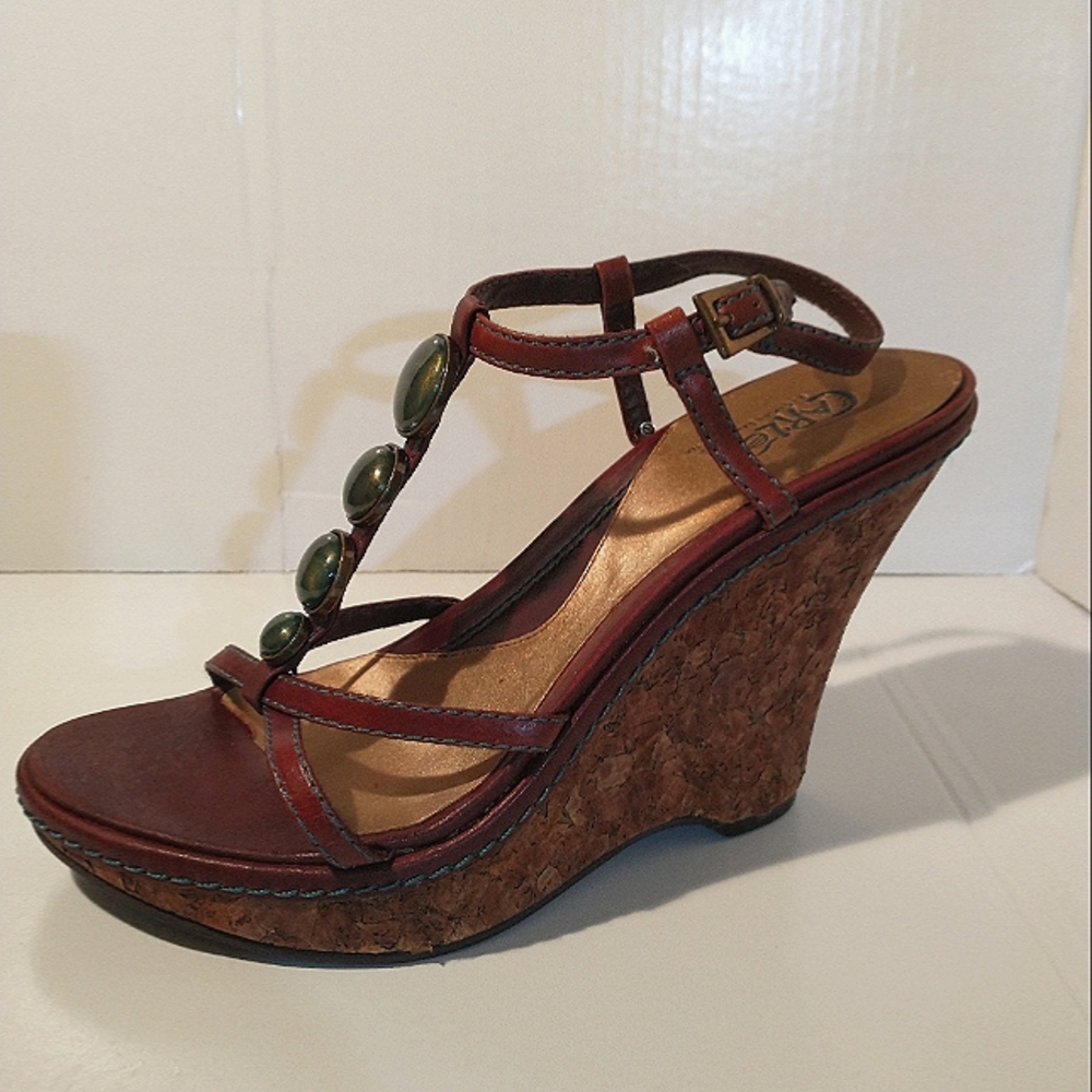 Carlos Santana wedge strappy sandals size 6 Brown upper straps with green gems.